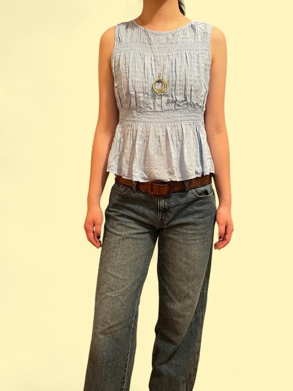 Brand new Blue, ruffle sleeveless top with keyhole back.